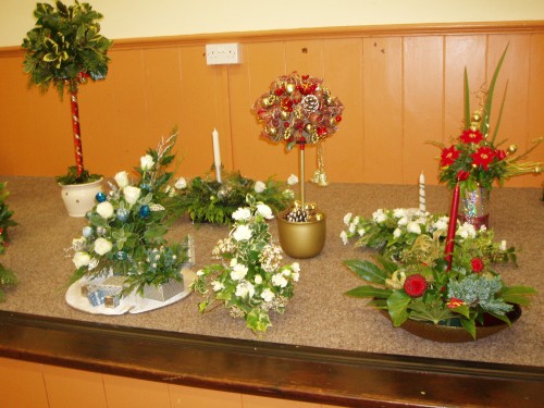 Tableau of Christmas Flower Arrangements